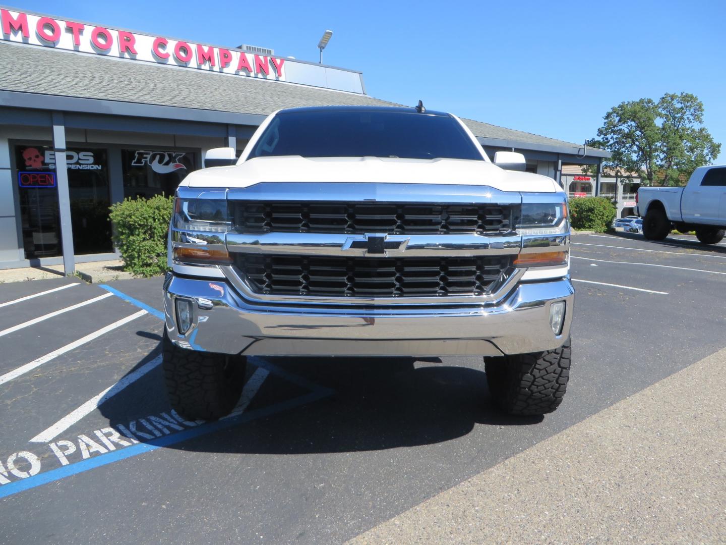 2018 White /BLACK Chevrolet Silverado 1500 LT (3GCPCREC7JG) with an 5.3L V8 OHV 16V engine, automatic transmission, located at 2630 Grass Valley Highway, Auburn, CA, 95603, (530) 508-5100, 38.937893, -121.095482 - Must see Pre Runner.... CST front lift spindals, Camburg UCA's, King Adjustable 2.5 Coil-overs, King 2.5 rear shocks, 35" Toyo RT Trail tires, 17" Method Race wheels, MZ front skid plate, G2 rear differntail cover, Full size bed mounted spare tire, Black Vinyl roof wrap, smoke tail lights and 3rd br - Photo#1